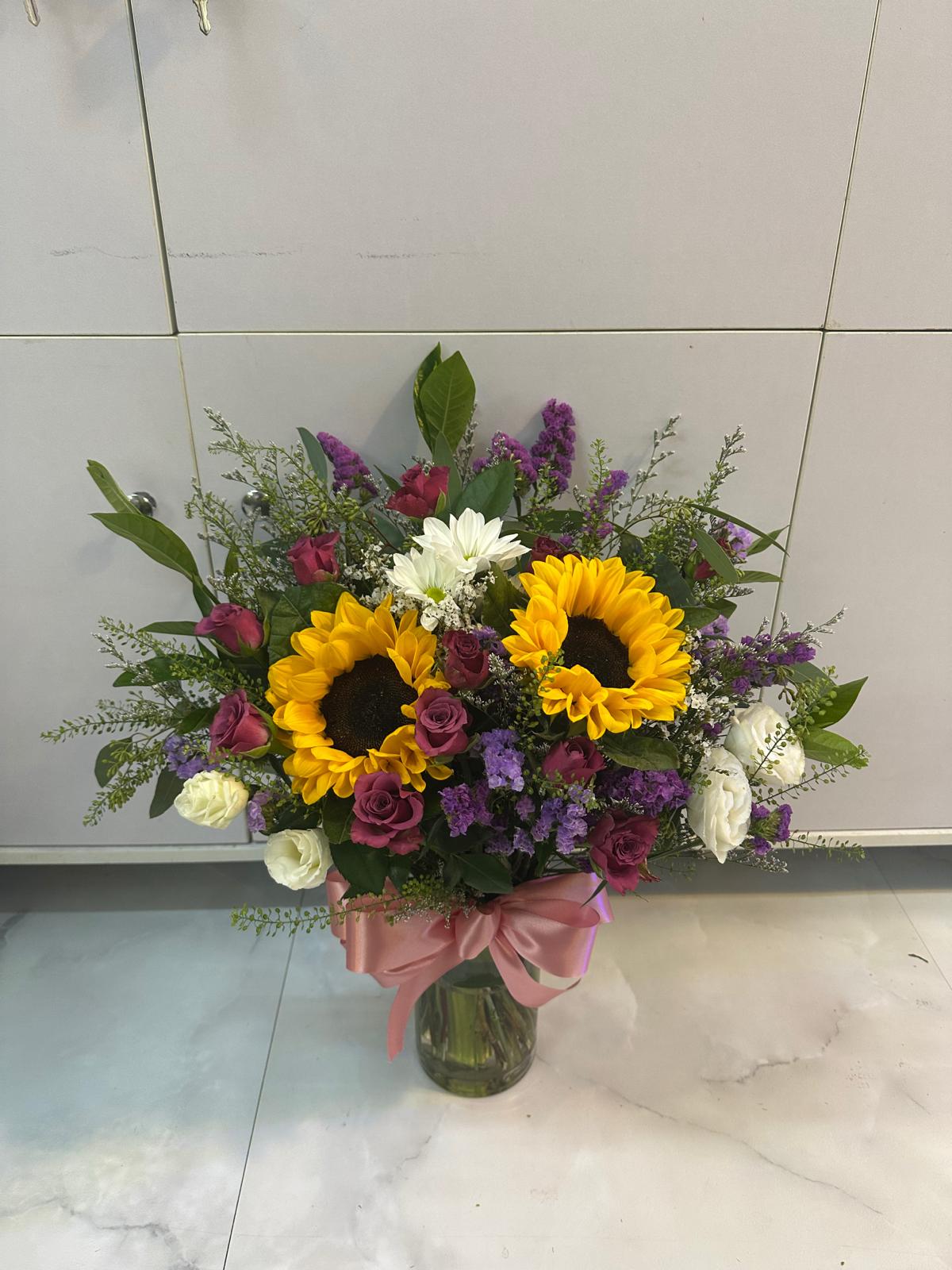 sunflower and mini rose in Vase